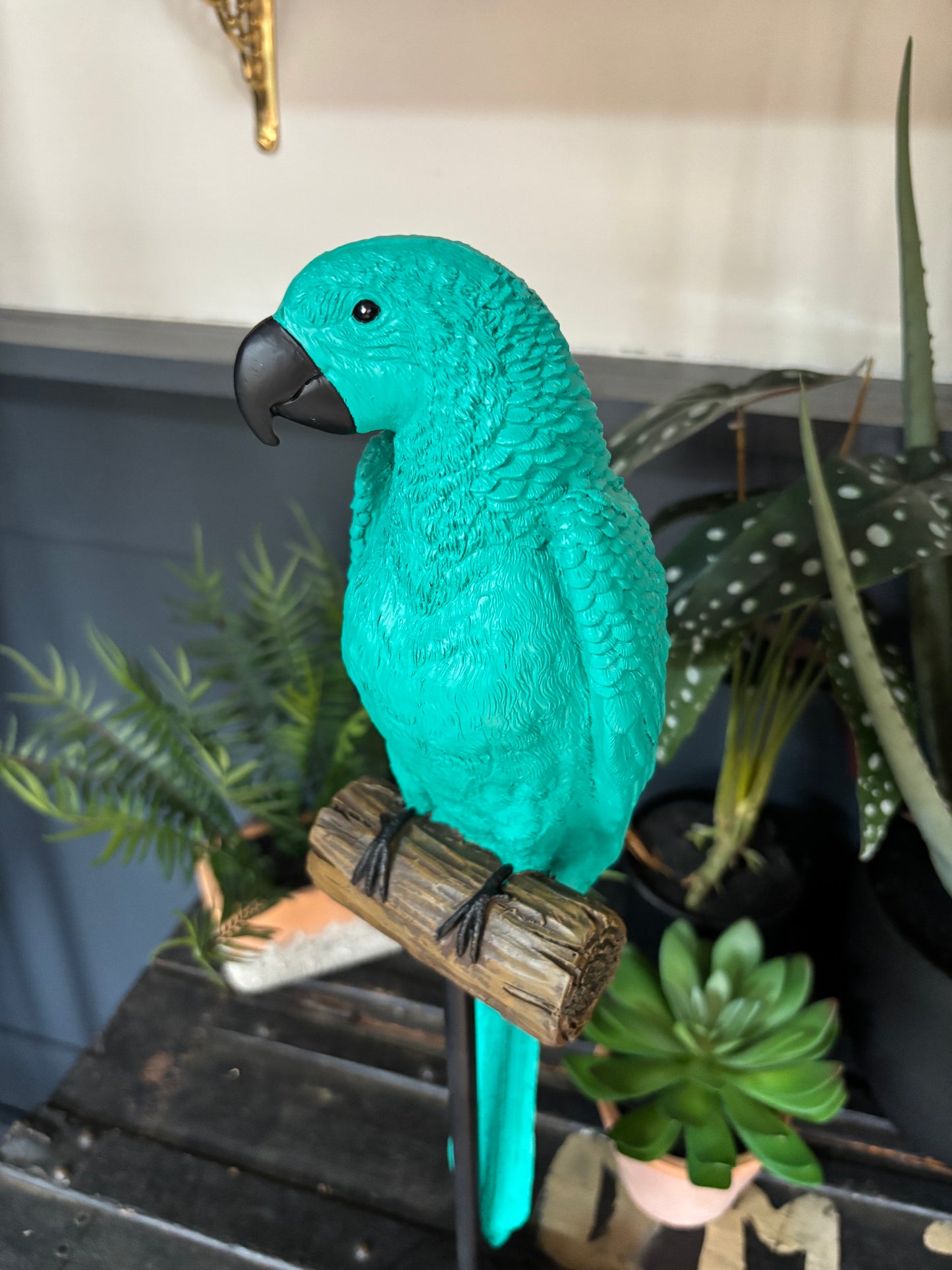 Bright Green Parrot on a Perch